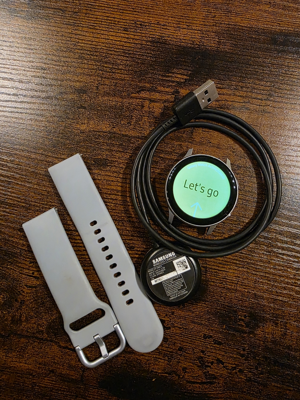 Samsung Silver Smartwatch with Light Gray Silicone Band